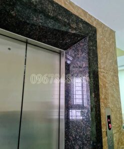Thang máy ốp đá granite tự nhiên nâu anh quốc